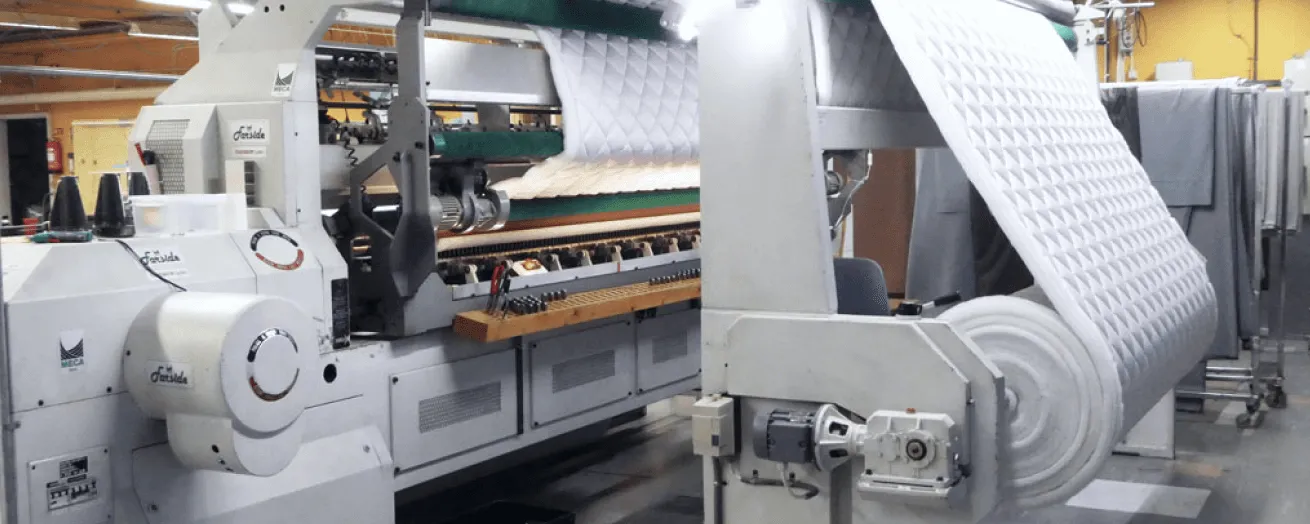 Quiltmaskin i fabriken i Lidköping